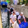 HUT BRI ke-128 Adakan Aksi Bersih Sungai Muara Condet dan Tanam Pohon